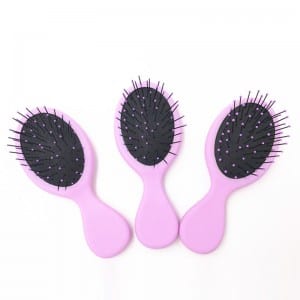 Pink plastic paddle mini detangle massage mini hair brush